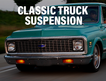 Image of a blue Chevy C10 classic truck with upgraded QA1 suspension kit racing down the road with a text overlay that reads 
