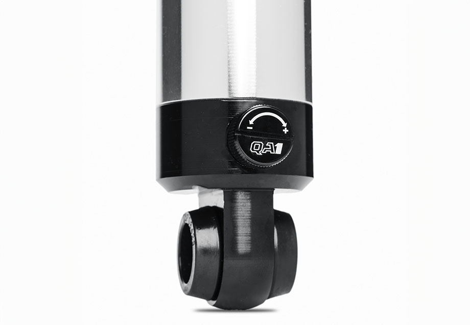 Single adjustable QA1 shocks for simultaneous compression and rebound. Single adjustable QA1 shocks for simultaneous compression and rebound.